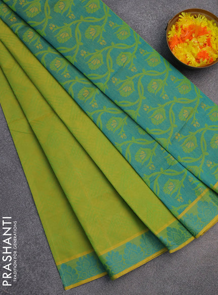 Coimbatore cotton saree light green and teal blue with allover self emboss and thread woven border