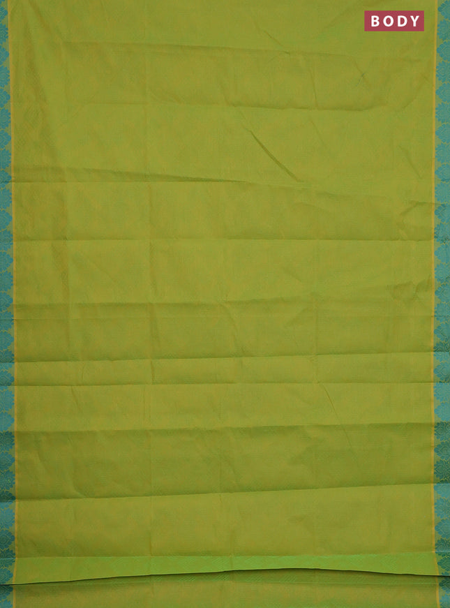 Coimbatore cotton saree light green and teal blue with allover self emboss and thread woven border