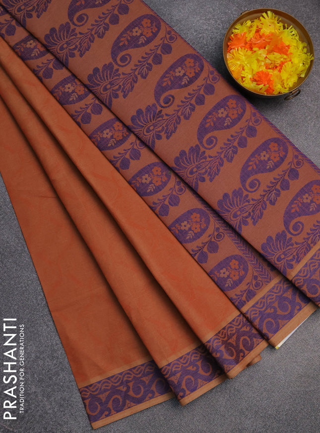 Coimbatore cotton saree rust shade and blue with allover self emboss and thread woven border