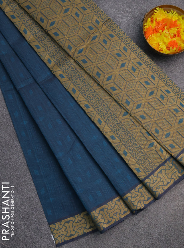Coimbatore cotton saree peacock blue and sandal with allover self emboss and thread woven border