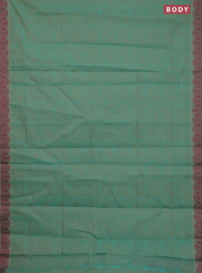 Coimbatore cotton saree dual shade of teal bluish sandal and maroon with allover self emboss and thread woven border