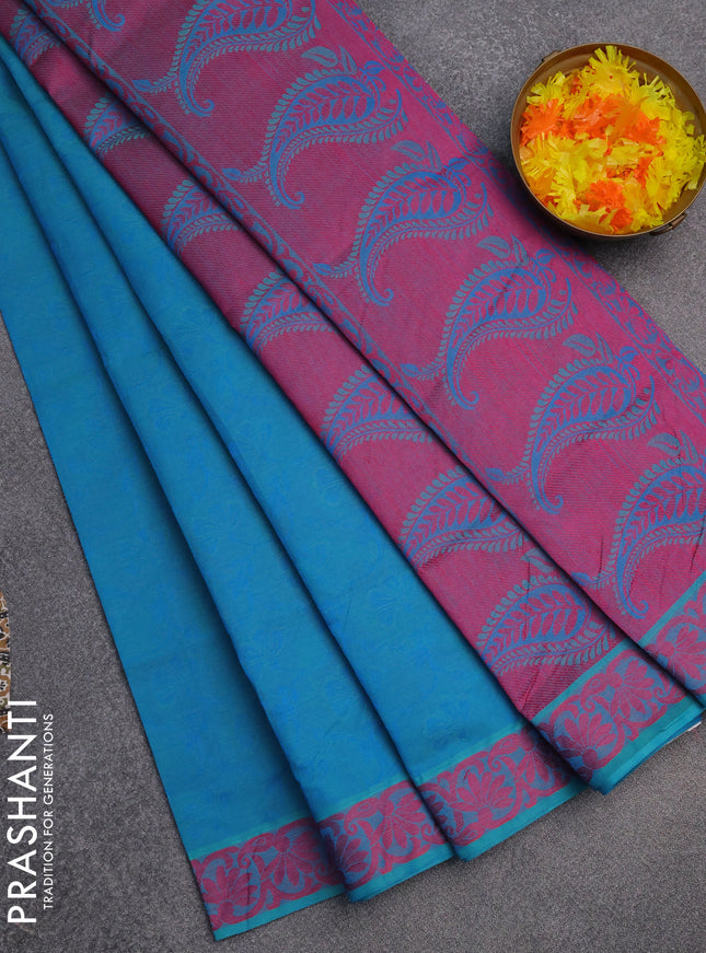 Coimbatore cotton saree teal blue and pink with allover self emboss and thread woven border