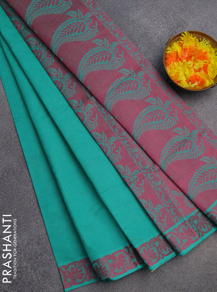 Coimbatore cotton saree teal green and pink with allover self emboss and thread woven border