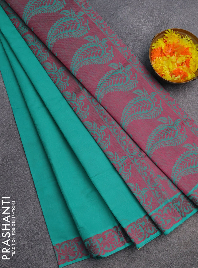 Coimbatore cotton saree teal green and pink with allover self emboss and thread woven border