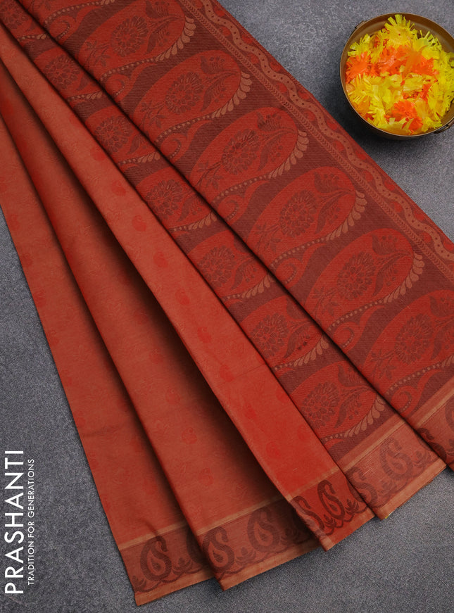 Coimbatore cotton saree rustic orange with allover self emboss and thread woven border