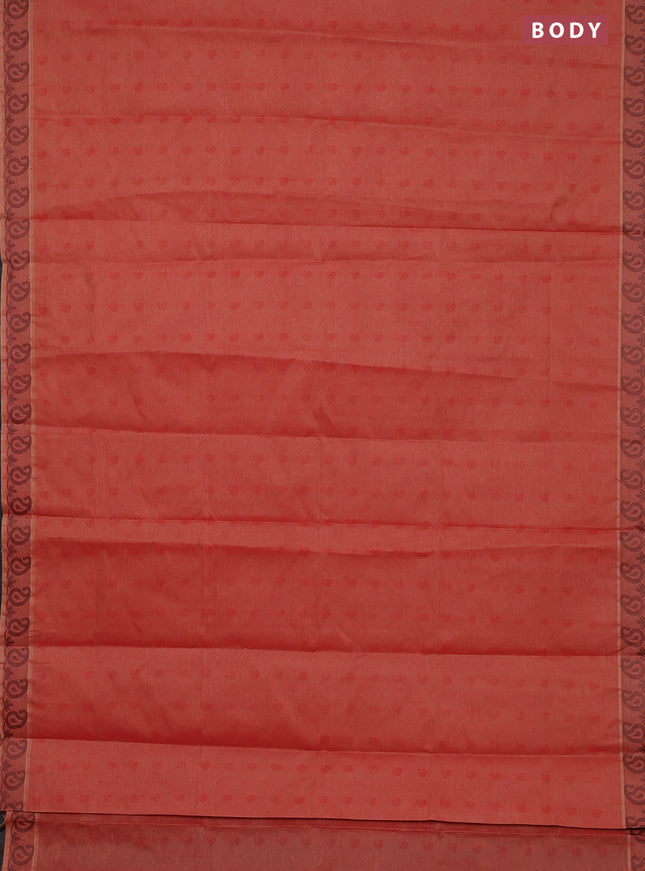 Coimbatore cotton saree rustic orange with allover self emboss and thread woven border