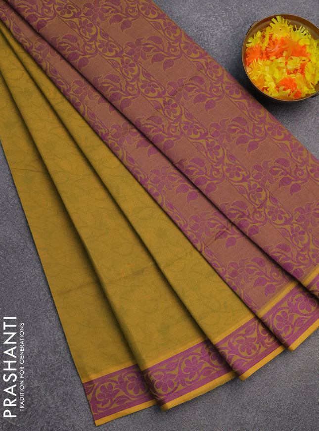 Coimbatore cotton saree mustard green and purple with allover self emboss and thread woven border