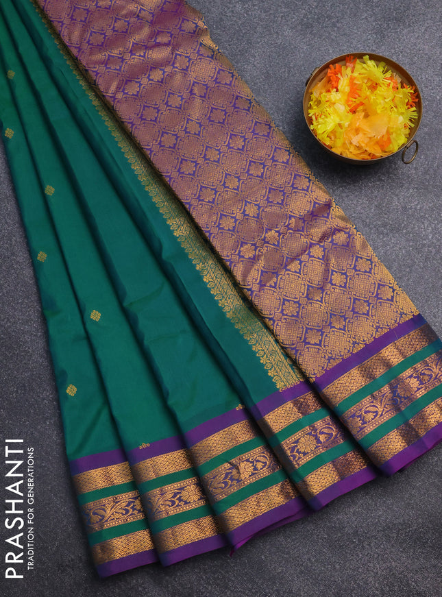 Gadwal silk cotton saree dual shade of green and purple with zari woven paisley buttas and zari woven border