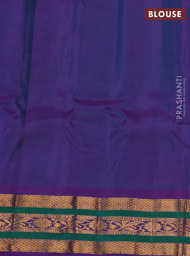 Gadwal silk cotton saree dual shade of green and purple with zari woven paisley buttas and zari woven border