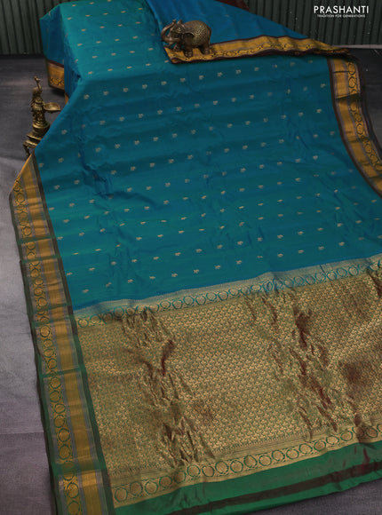 Gadwal silk cotton saree dual shade of teal green and dual shade of maroon with allover zari woven paisley buttas and zari woven border
