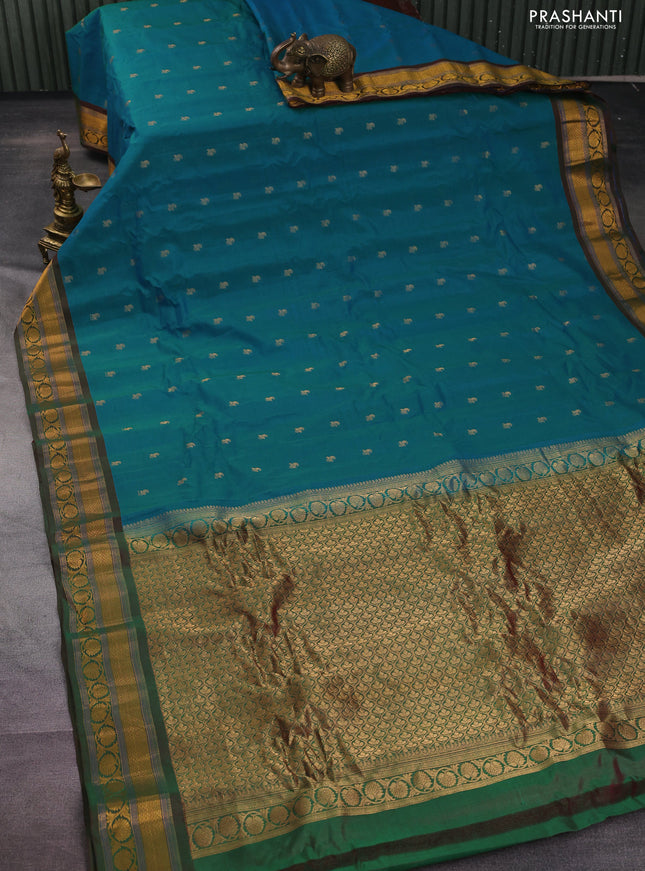 Gadwal silk cotton saree dual shade of teal green and dual shade of maroon with allover zari woven paisley buttas and zari woven border