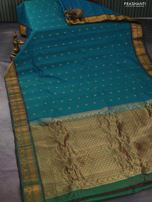 Gadwal silk cotton saree dual shade of teal green and dual shade of maroon with allover zari woven paisley buttas and zari woven border