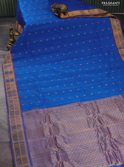 Gadwal silk cotton saree dual shade of blue and purple with allover zari woven paisley buttas and zari woven border