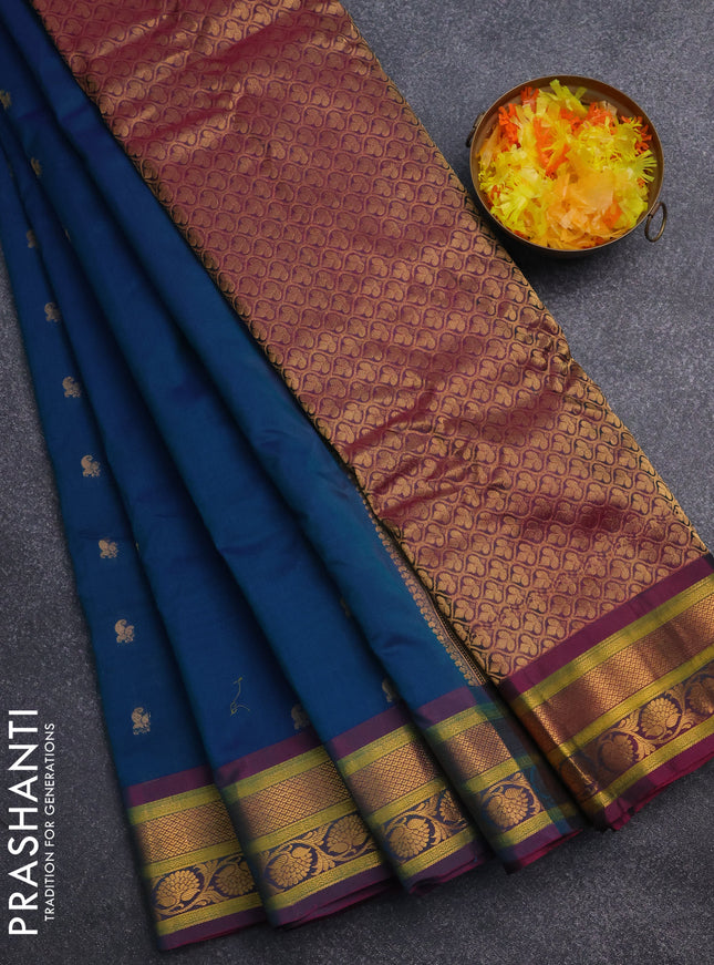 Gadwal silk cotton saree dual shade of teal green and dual shade of pink with allover zari woven paisley buttas and zari woven border