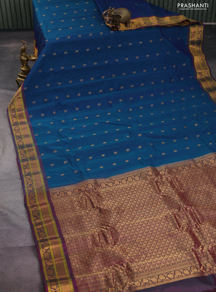 Gadwal silk cotton saree dual shade of teal green and dual shade of pink with allover zari woven paisley buttas and zari woven border