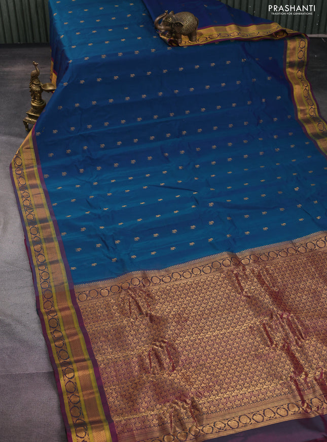 Gadwal silk cotton saree dual shade of teal green and dual shade of pink with allover zari woven paisley buttas and zari woven border