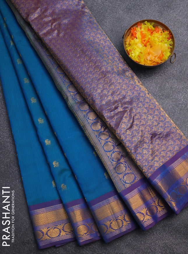 Gadwal silk cotton saree teal bluish green and purple with allover zari woven paisley buttas and zari woven border
