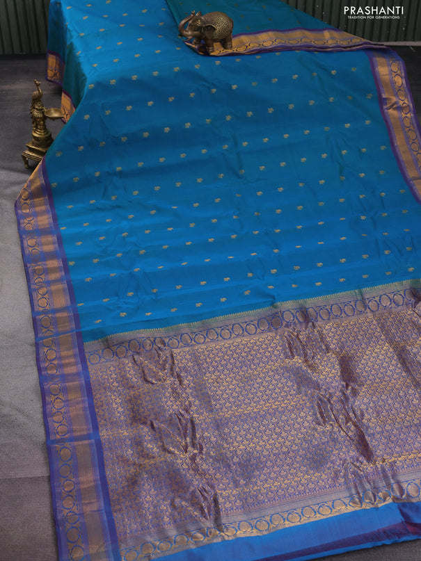 Gadwal silk cotton saree teal bluish green and purple with allover zari woven paisley buttas and zari woven border