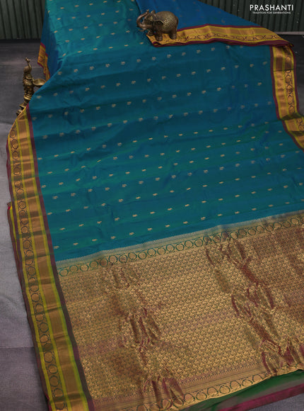 Gadwal silk cotton saree dual shade of teal greenish blue and dual shade of pink with allover zari woven paisley buttas and zari woven border