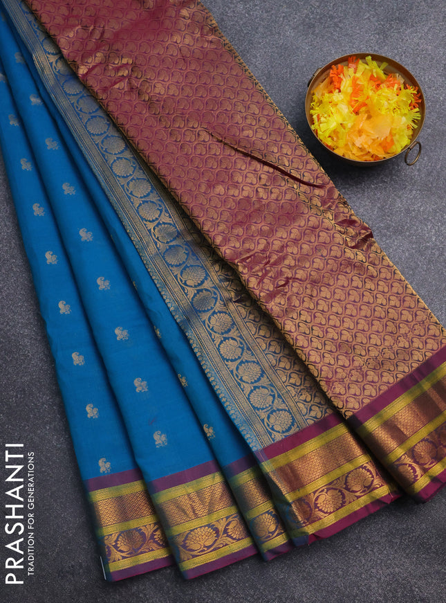 Gadwal silk cotton saree dual shade of teal blue and dual shade of pink with allover zari woven paisley buttas and zari woven border