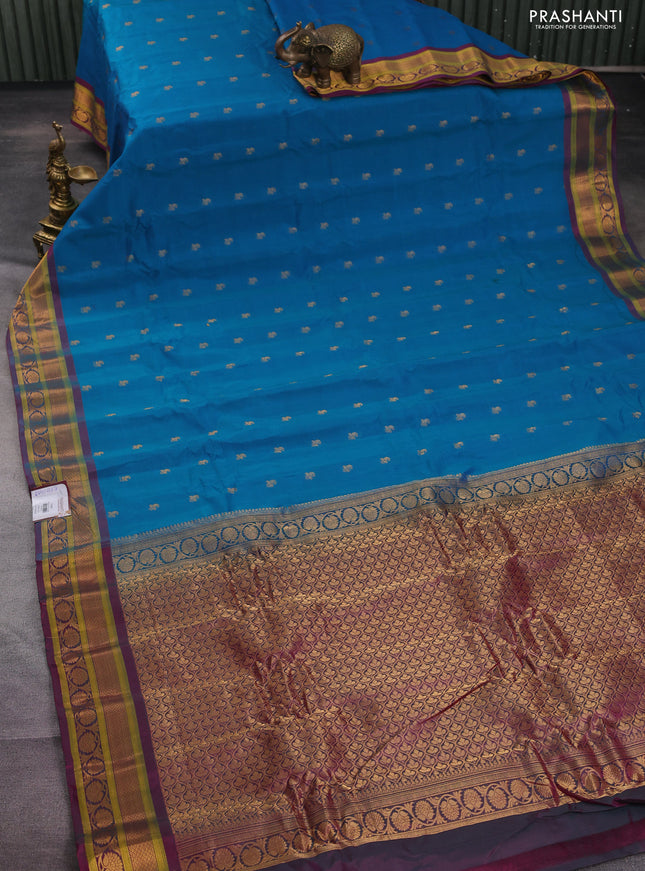 Gadwal silk cotton saree dual shade of teal blue and dual shade of pink with allover zari woven paisley buttas and zari woven border