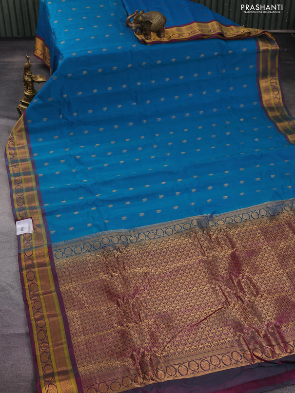 Gadwal silk cotton saree dual shade of teal blue and dual shade of pink with allover zari woven paisley buttas and zari woven border