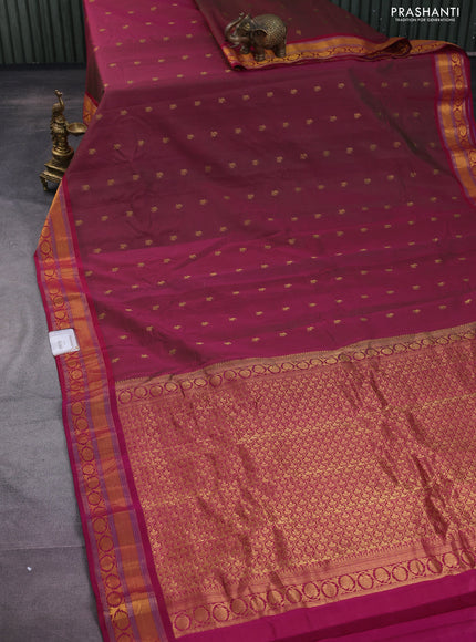 Gadwal silk cotton saree dual shade of magenta pinkish green and dark pink with allover zari woven paisley buttas and zari woven border