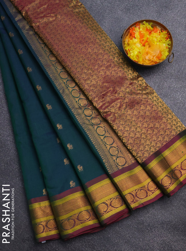 Gadwal silk cotton saree dual shade of green and pink with allover zari woven paisley buttas and zari woven border