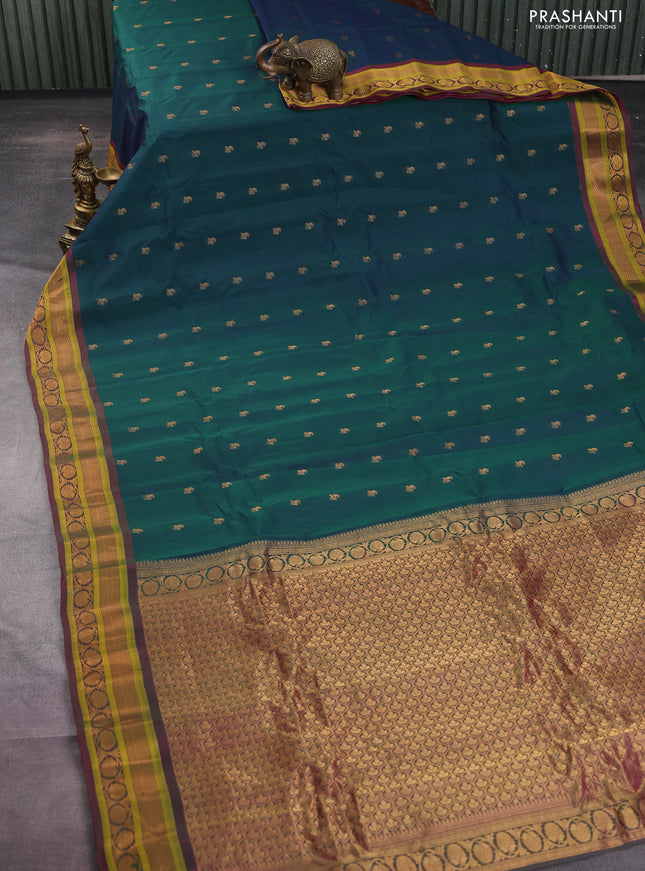 Gadwal silk cotton saree dual shade of green and pink with allover zari woven paisley buttas and zari woven border