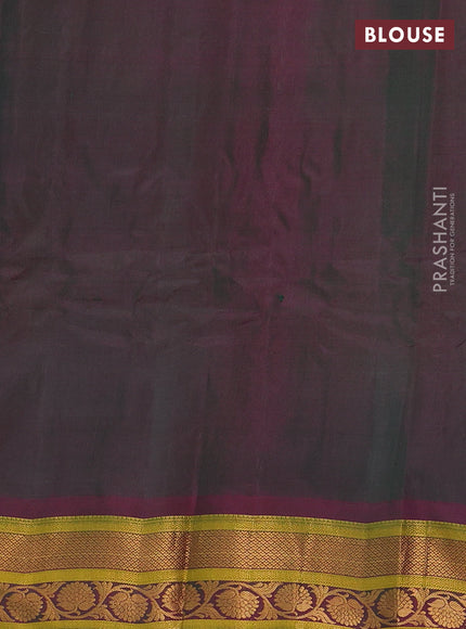 Gadwal silk cotton saree dual shade of green and pink with allover zari woven paisley buttas and zari woven border