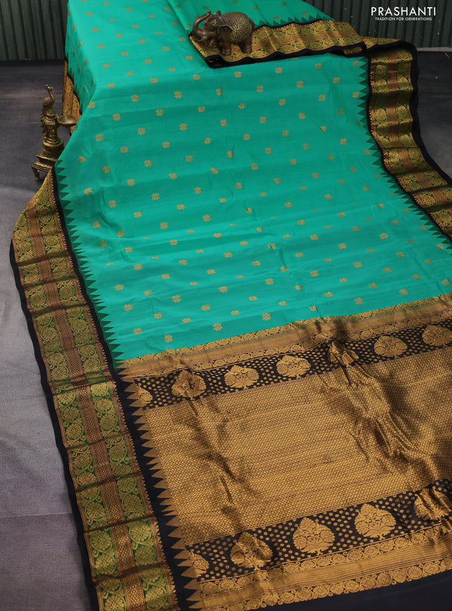 Gadwal silk cotton saree teal green shade and black with zari wovenf loral buttas and temple design zari woven border