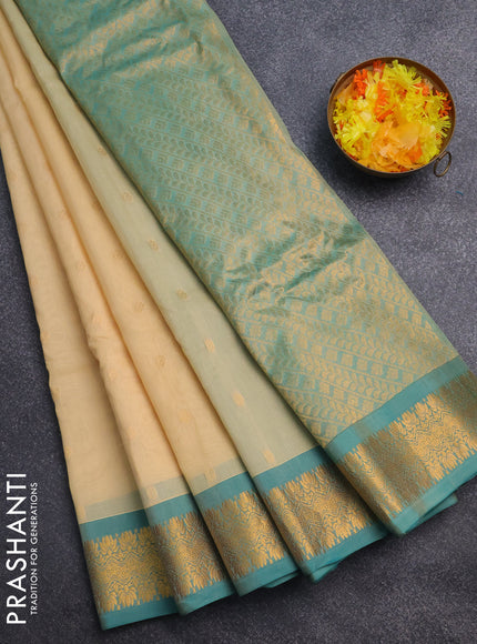 Gadwal silk cotton saree cream and teal blue with zari woven buttas and zari woven border