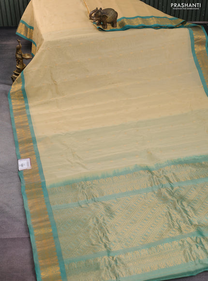 Gadwal silk cotton saree cream and teal blue with zari woven buttas and zari woven border