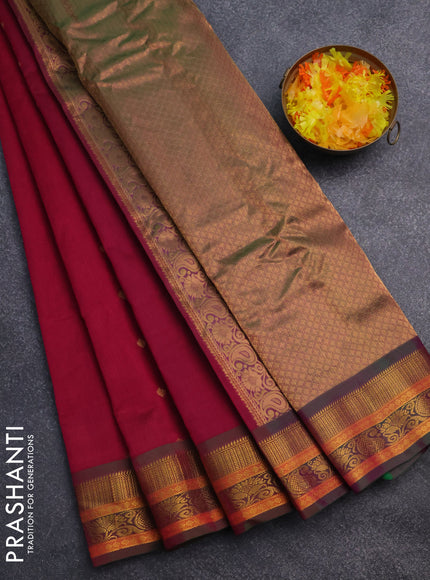 Gadwal silk cotton saree magenta pink and dual shade of green with allover zari woven buttas and zari woven border