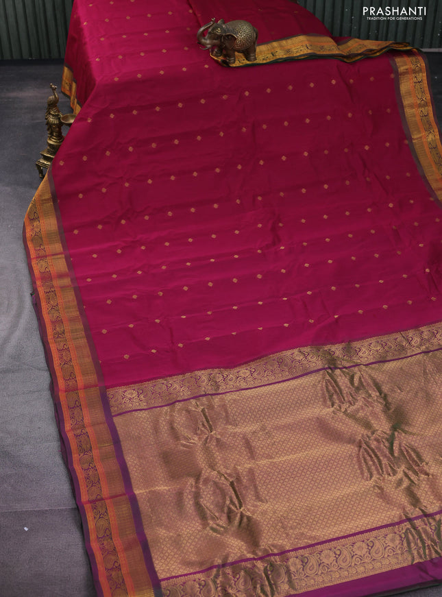 Gadwal silk cotton saree magenta pink and dual shade of green with allover zari woven buttas and zari woven border