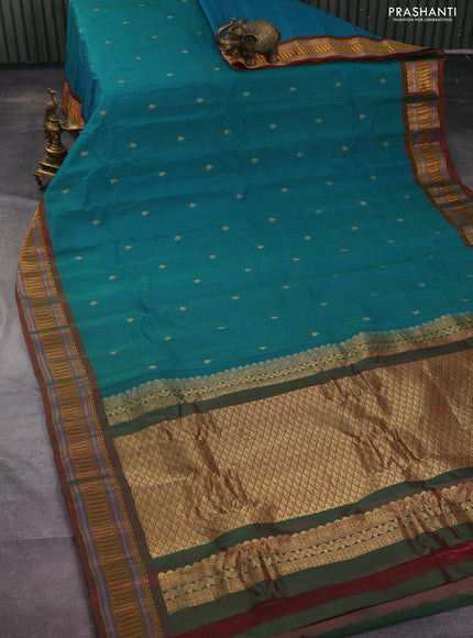 Gadwal silk cotton saree dual shade of teal greenish blue and dual shade of maroon with zari woven buttas and zari woven border
