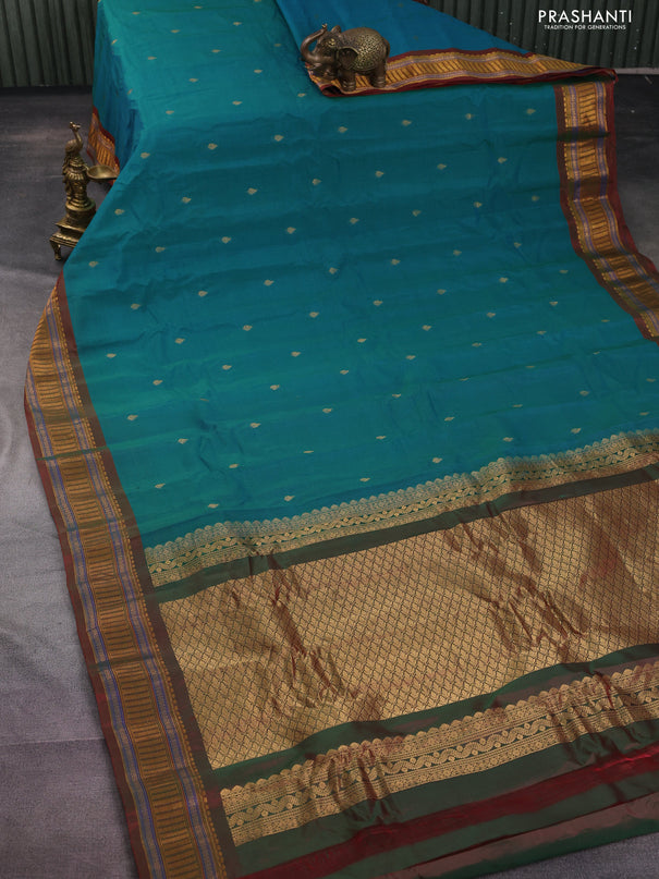 Gadwal silk cotton saree dual shade of teal greenish blue and dual shade of maroon with zari woven buttas and zari woven border