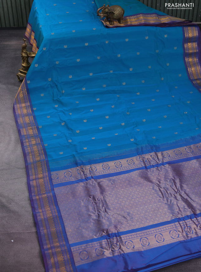 Gadwal silk cotton saree dual shade of bluish green and dual shade of maroon with zari woven buttas and zari woven border