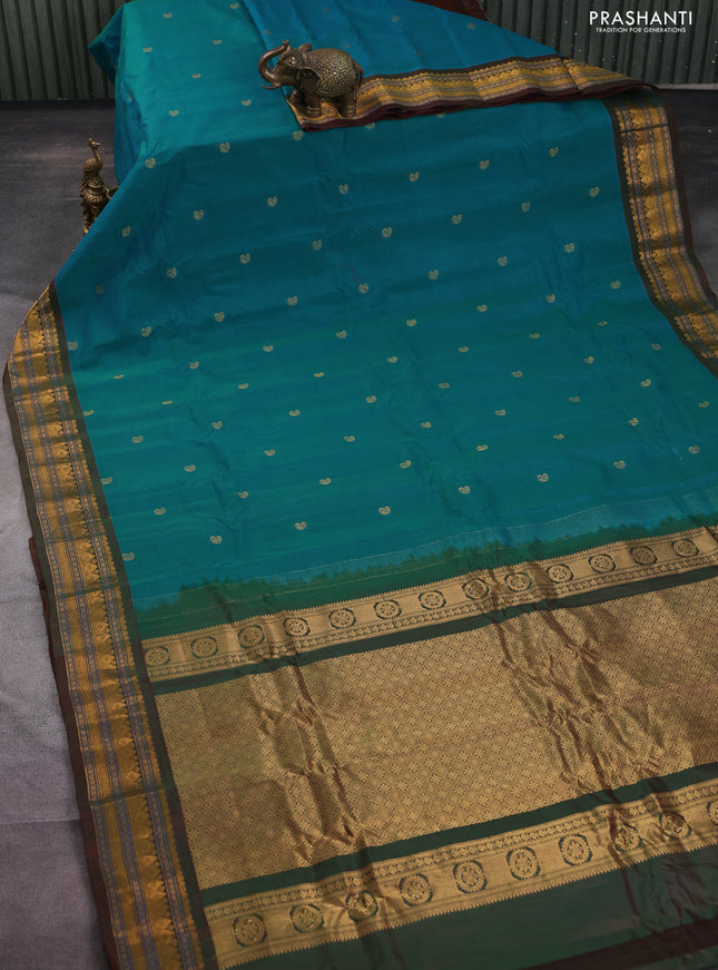 Gadwal silk cotton saree dual shade of teal bluish green and dual shade of maroon with zari woven paisley buttas and zari woven border