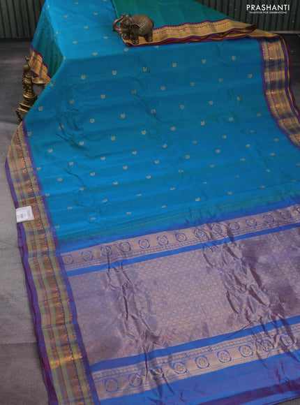 Gadwal silk cotton saree dual shade of greenish blue and dual shade of maroon with zari woven paisley buttas and zari woven border