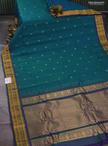 Gadwal silk cotton saree dual shade of greenish blue and dual shade of violet with zari woven paisley buttas and zari woven border
