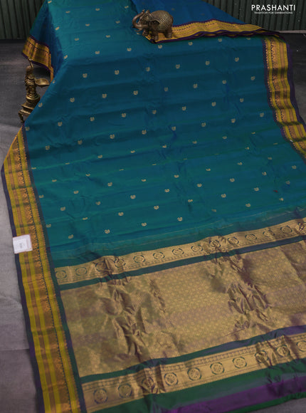 Gadwal silk cotton saree dual shade of greenish blue and violet with zari woven paisley buttas and zari woven border