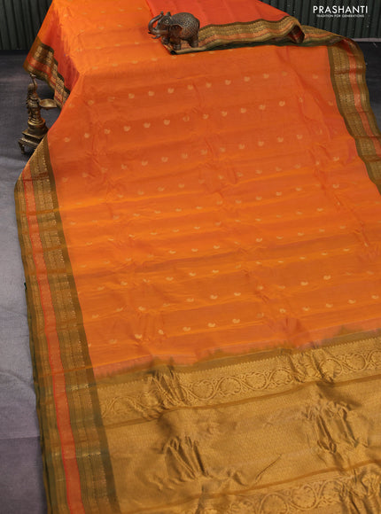 Gadwal silk cotton saree sunset orange and dual shade of green with zari woven paisley buttas and zari woven border