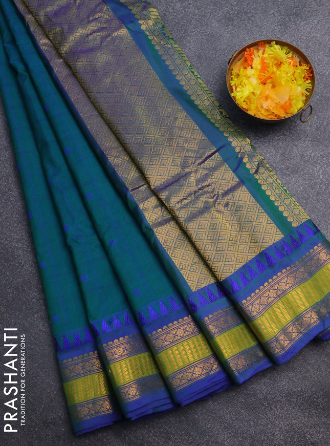 Gadwal silk cotton saree green and blue with allover checked pattern & thread buttas and zari woven border