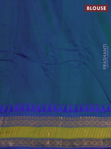 Gadwal silk cotton saree green and blue with allover checked pattern & thread buttas and zari woven border