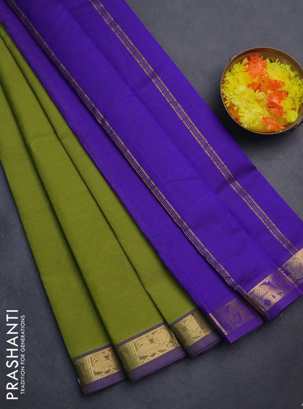Silk cotton saree light green and blue with plain body and zari woven border