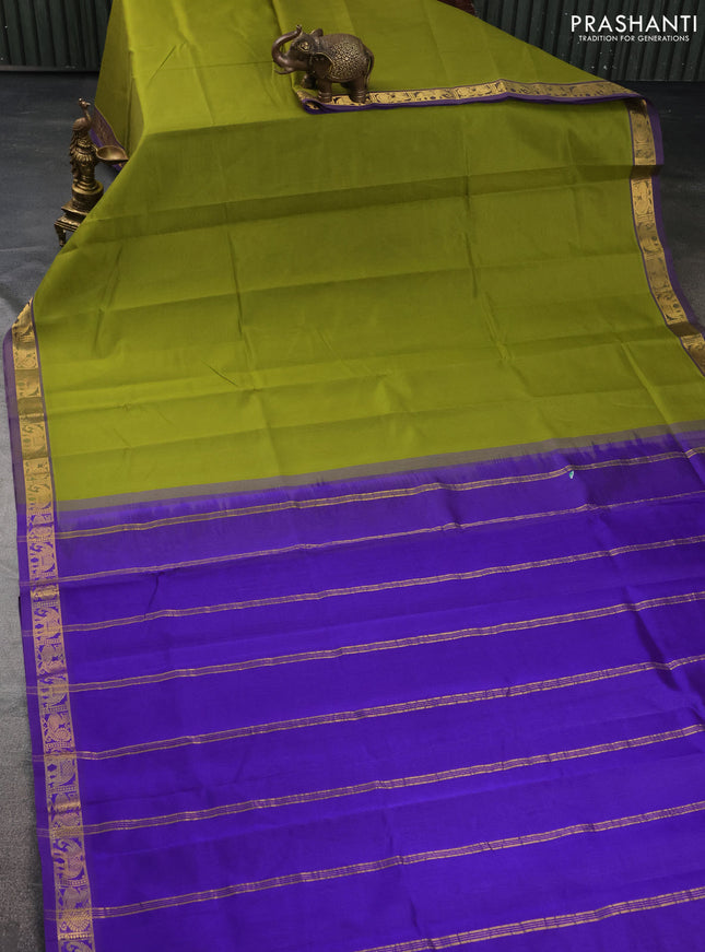 Silk cotton saree light green and blue with plain body and zari woven border