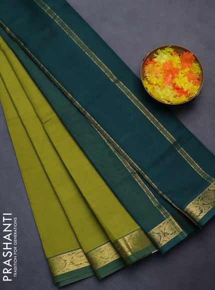 Silk cotton saree mehendi green and green with plain body and zari woven border