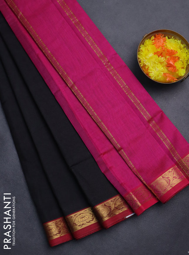 Silk cotton saree black and pink with plain body and zari woven border