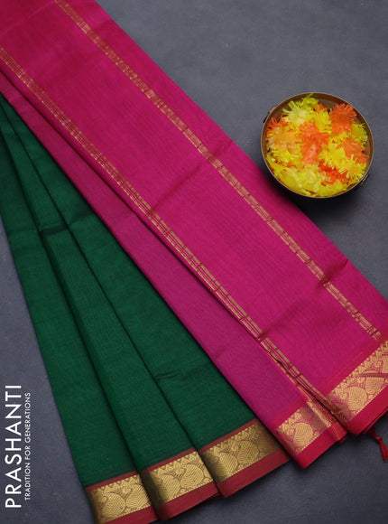 Silk cotton saree green and pink with plain body and zari woven border